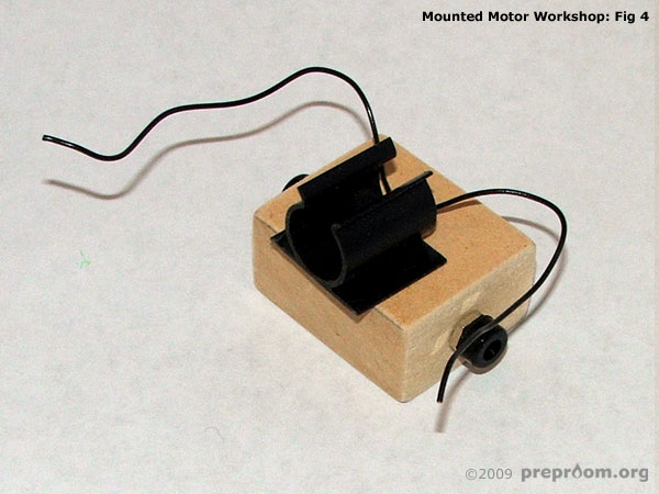 Fig 4: 4mm sockets in place and mini motor clip glued in place
