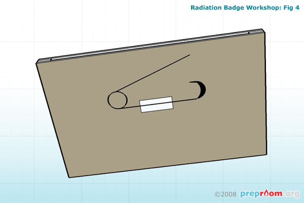 Fig 4: Attached a safety pin to the back of the badge 